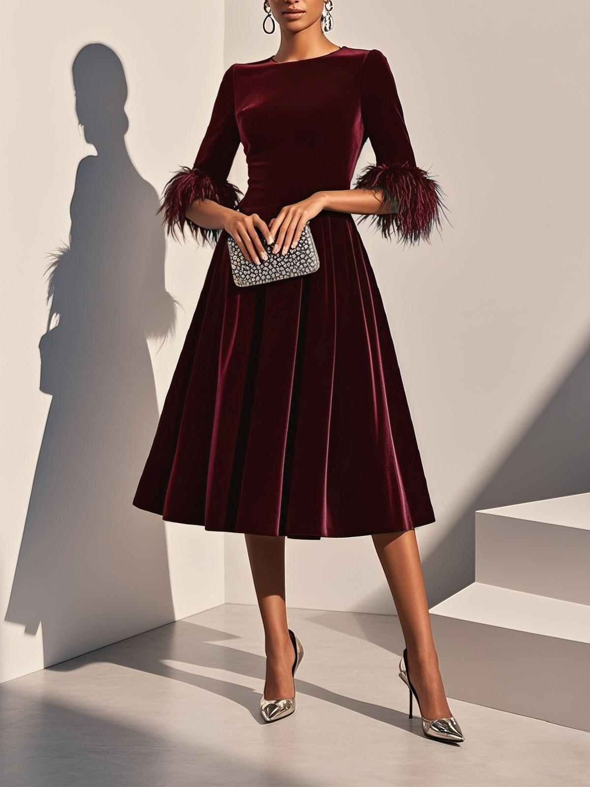 Leona | Elegante Jurken met veertjes