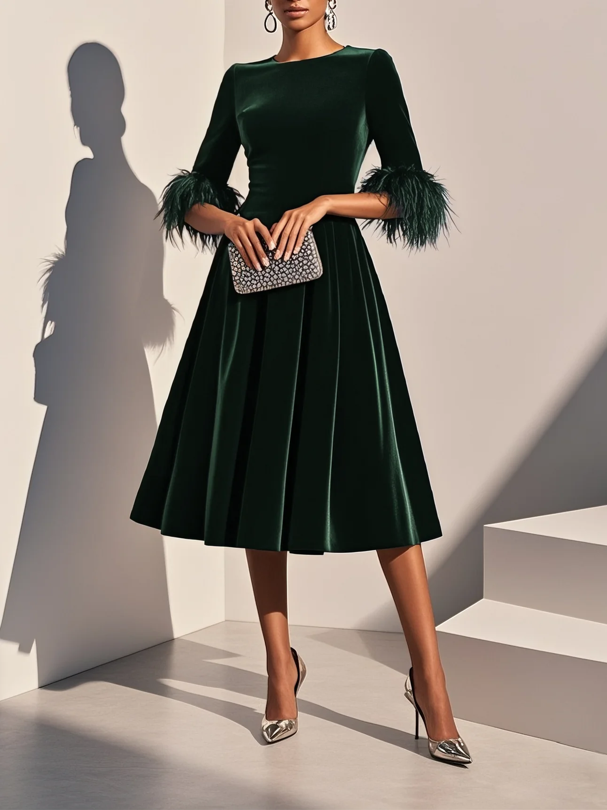 Leona | Elegante Jurken met veertjes