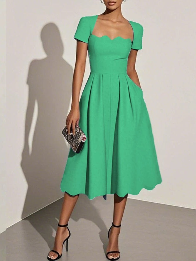 Jacobina | Elegante scallop jurken