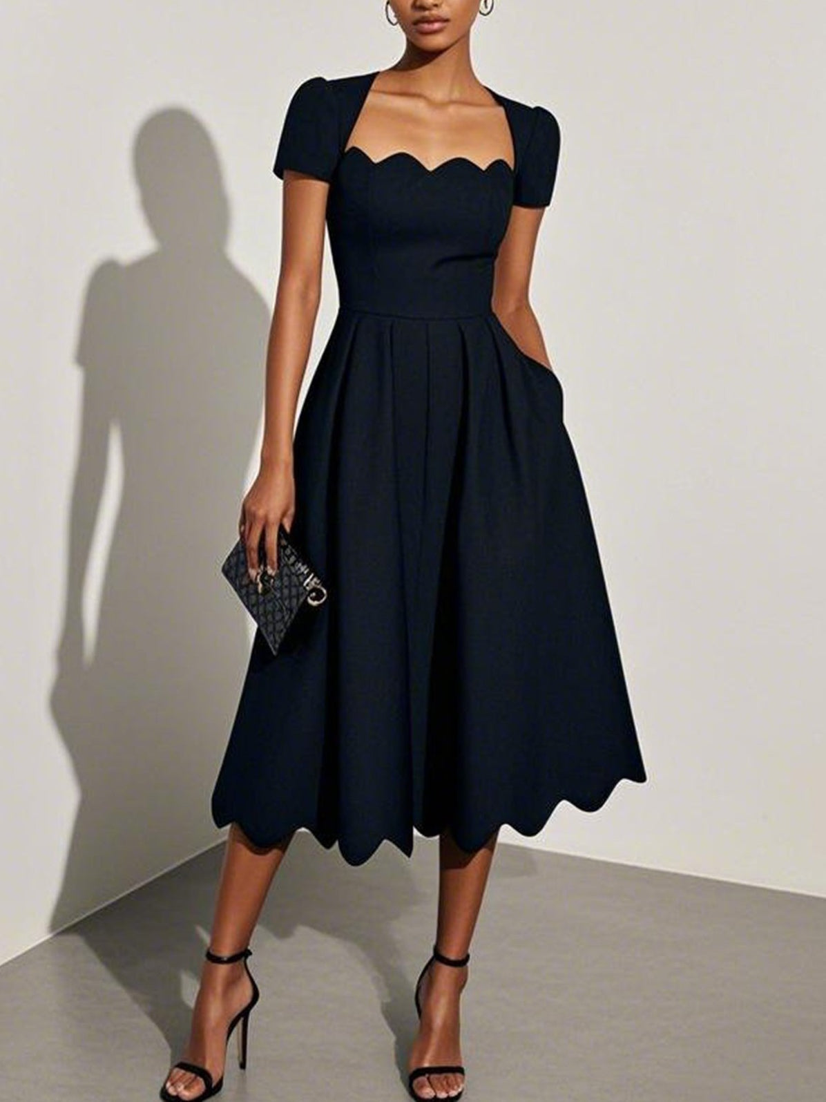 Jacobina | Elegante scallop jurken