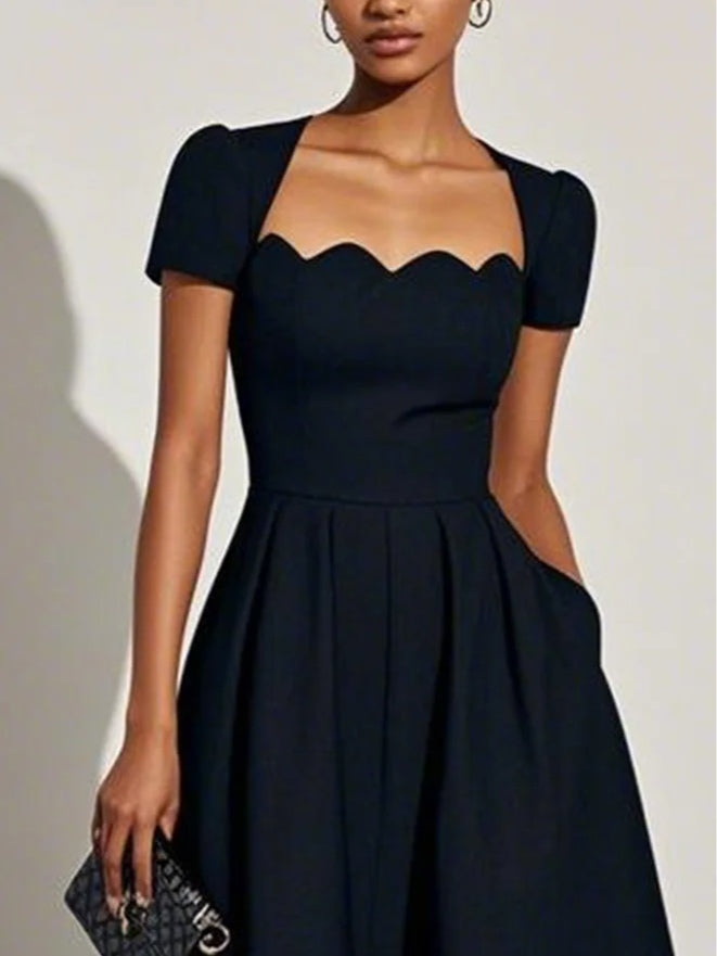 Jacobina | Elegante scallop jurken
