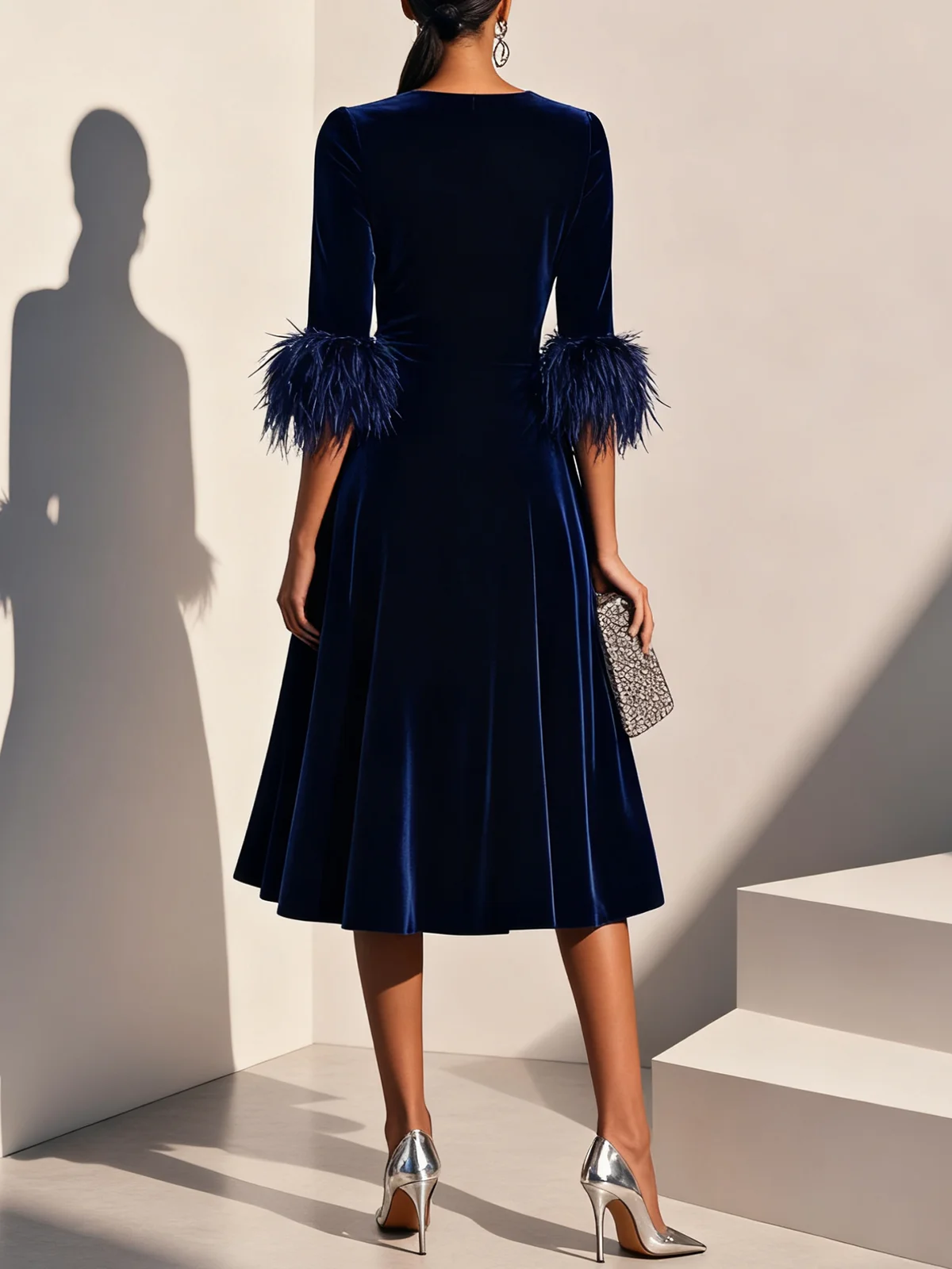 Leona | Elegante Jurken met veertjes