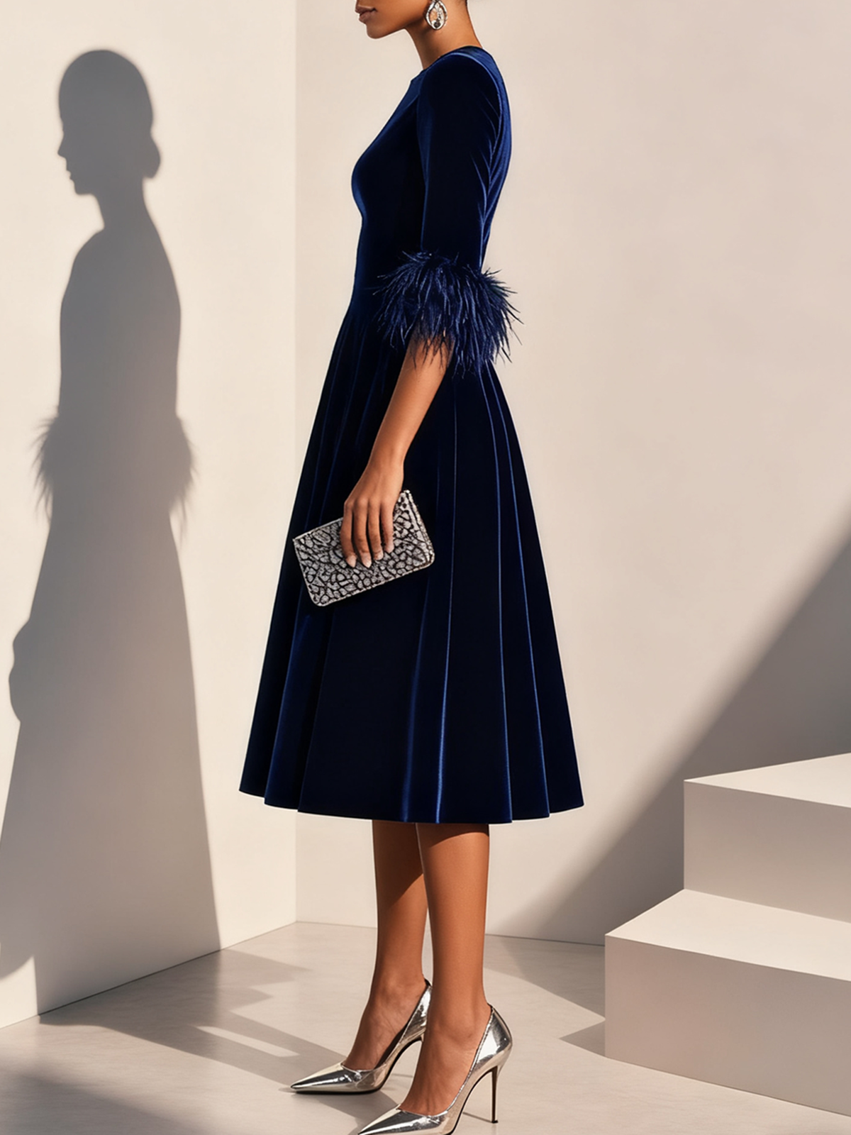 Leona | Elegante Jurken met veertjes