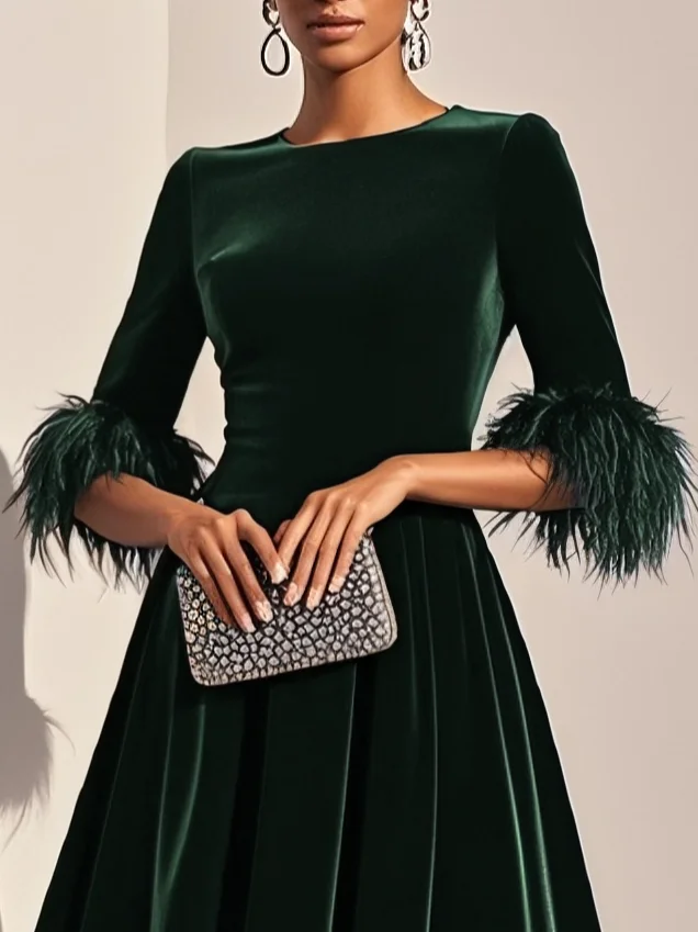 Leona | Elegante Jurken met veertjes