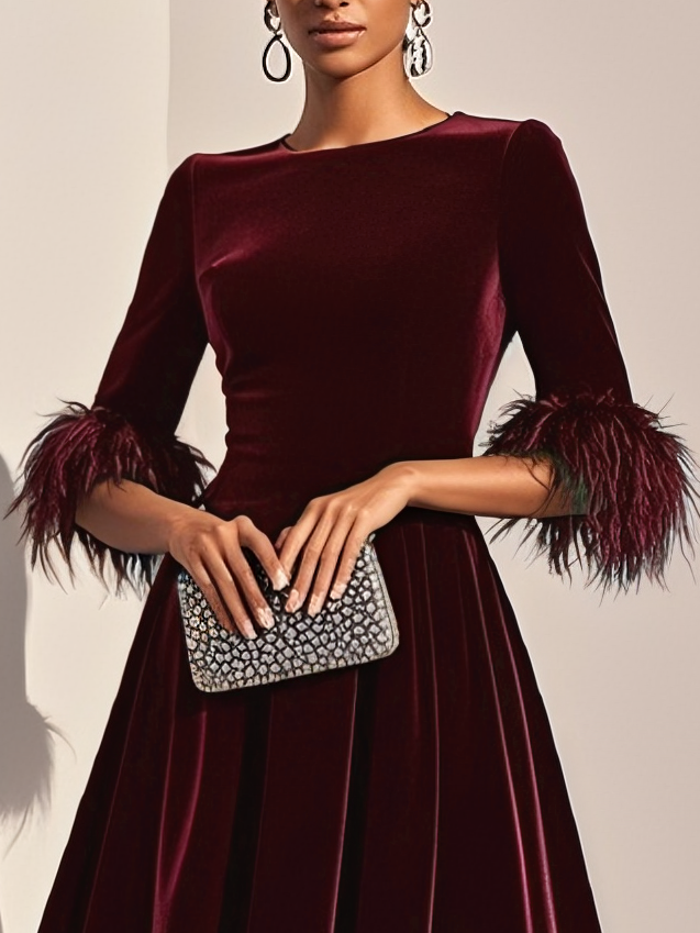 Leona | Elegante Jurken met veertjes
